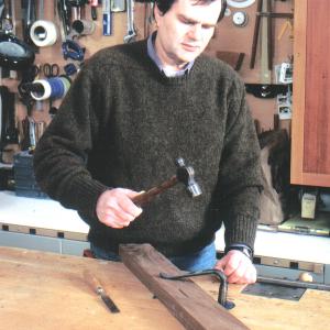 Curtis at his workbench